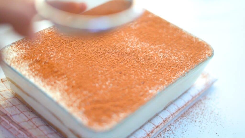 dust the tiramisu with cocoa powder